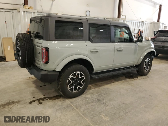 2022 Ford Bronco z VIN 1FMEE5DP8NLB90711, wystawiony jako Copart lot #63755395 z przebiegiem 22 660 mil mil oraz Szkoda całkowita • Salvage title. Historia ofert i sprzedaży dostępna na DreamBid. Obrazek 3.