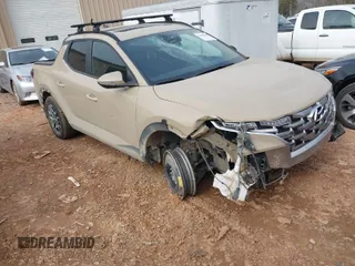 2023 Hyundai Santa Cruz SEL Premium z VIN 5NTJDDAF7PH046605, wystawiony jako IAAI lot #41488316 z przebiegiem 68 562 mil mil oraz . Historia ofert i sprzedaży dostępna na DreamBid. Obrazek 1.