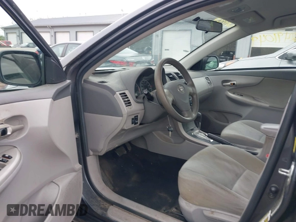 2010 Toyota Corolla with VIN 2T1BU4EEXAC418520, listed as a IAAI auction lot 42491049 with 104,218 mi miles and . Bid and sale history available at DreamBid. Image 5.