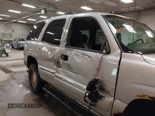 2004 GMC Yukon SLT with VIN 1GKEK13TX4J155865, listed as a IAAI auction lot 41758663 with 281,531 mi miles. Bid and sale history available at carsss.com. Image 6.