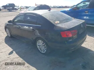 2013 Volkswagen Jetta TDI w/Premium/Nav with VIN 3VWLL7AJ8DM285616, listed as a IAAI auction lot 41597180 with 197,150 mi miles and . Bid and sale history available at DreamBid. Image 3.