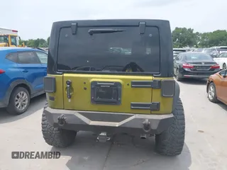 2008 Jeep Wrangler Unlimited Sahara with VIN 1J8GA59108L574959, listed as a IAAI auction lot 42171011 with Not Provided miles and . Bid and sale history available at carsss.com. Image 16.