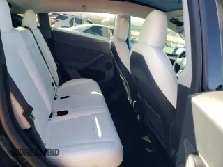 2023 Tesla Model Y Performance with VIN 7SAYGDEF3PF773031, listed as a Copart auction lot 47105765 with 25,604 mi miles and Salvage Title. Bid and sale history available at DreamBid. Image 10.