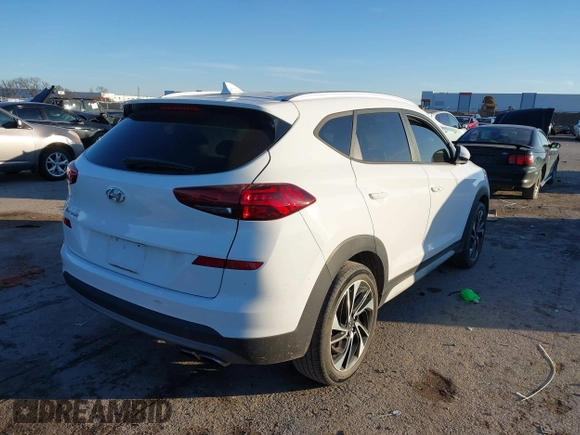 2019 Hyundai Tucson Sport with VIN KM8J33AL1KU838499, listed as a IAAI auction lot 41317832 with 71,594 mi miles. Bid and sale history available at carsss.com. Image 4.