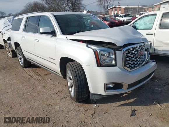 2020 GMC Yukon XL Denali with VIN 1GKS1HKJ6LR282854, listed as a IAAI auction lot 41717072 with 56,715 mi miles and . Bid and sale history available at DreamBid. Image 1.