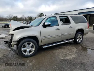 2014 Chevrolet Suburban LTZ with VIN 1GNSCKE08ER129201, listed as a Copart auction lot 86920874 with 149,468 mi miles and Salvage title. Bid and sale history available at DreamBid. Image 1.
