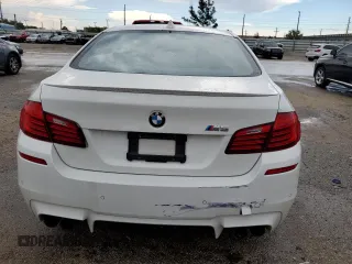 2016 BMW M5 z VIN WBSFV9C52GG343300, wystawiony jako Copart lot #49419563 z przebiegiem 39 217 mil mil oraz . Historia ofert i sprzedaży dostępna na DreamBid. Obrazek 6.
