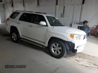 2012 Toyota 4Runner SR5 with VIN JTEBU5JR7C5102714, listed as a Copart auction lot 57055825 with 227,904 mi miles and Salvage title. Bid and sale history available at DreamBid. Image 4.