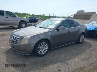 2012 Cadillac CTS Luxury with VIN 1G6DE5E56C0132613, listed as a IAAI auction lot 42116862 with 81,617 mi miles and . Bid and sale history available at DreamBid. Image 2.