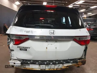 2013 Honda Odyssey EX-L with VIN 5FNRL5H66DB071151, listed as a IAAI auction lot 41914345 with 194,804 mi miles and . Bid and sale history available at carsss.com. Image 6.