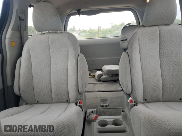 2012 Toyota Sienna LE AAS with VIN 5TDKK3DC2CS217382, listed as a Copart auction lot 58067475 with 146,769 mi miles and Salvage title. Bid and sale history available at DreamBid. Image 10.