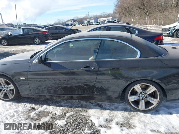 2007 BMW 3 Series 335i with VIN WBAWL73557PX49456, listed as a IAAI auction lot 41396731 with 99,159 mi miles. Bid and sale history available at carsss.com. Image 14.