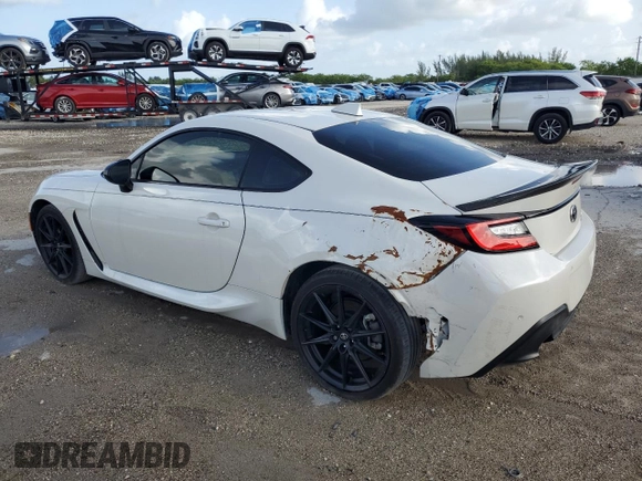 2023 Toyota 86 Premium z VIN JF1ZNBF13P8764107, wystawiony jako Copart lot #60854725 z przebiegiem 4 990 mil mil oraz Czysty tytuł • Clean title. Historia ofert i sprzedaży dostępna na DreamBid. Obrazek 2.