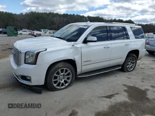 2016 GMC Yukon Denali with VIN 1GKS1CKJ4GR180185, listed as a Copart auction lot 47815835 with 197,506 mi miles and Salvage Title. Bid and sale history available at carsss.com. Image 1.