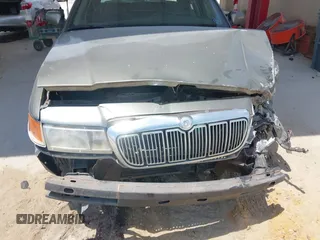 2001 Mercury Grand Marquis GS z VIN 2MEFM74W41X702619, wystawiony jako IAAI lot #42323749 z przebiegiem 124 748 mil mil oraz . Historia ofert i sprzedaży dostępna na DreamBid. Obrazek 6.