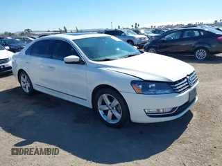2014 Volkswagen Passat SEL Premium with VIN 1VWCN7A36EC095327, listed as a IAAI auction lot 42827281 with 153,795 mi miles and . Bid and sale history available at DreamBid. Image 1.