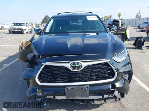 2021 Toyota Highlander L z VIN 5TDCZRBH1MS558663, wystawiony jako IAAI lot #42206187 z przebiegiem 49 574 mil mil oraz . Historia ofert i sprzedaży dostępna na DreamBid. Obrazek 13.
