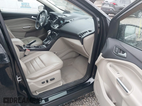 2016 Ford Escape Titanium with VIN 1FMCU9J93GUB93729, listed as a IAAI auction lot 42177294 with 158,859 mi miles and . Bid and sale history available at DreamBid. Image 5.