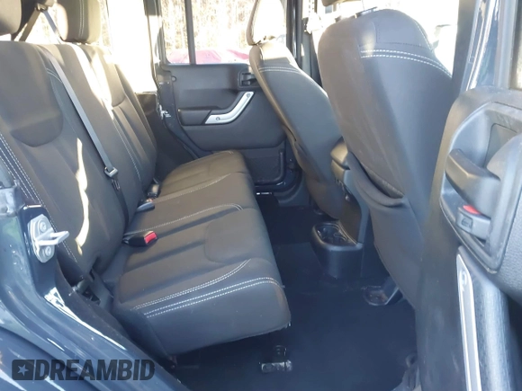 2017 Jeep Wrangler Unlimited Sahara with VIN 1C4BJWEGXHL686766, listed as a IAAI auction lot 41305319 with 97,806 mi miles. Bid and sale history available at carsss.com. Image 8.