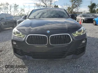 2019 BMW X2 sDrive28i with VIN WBXYJ3C56K5N36579, listed as a Copart auction lot 88320995 with 66,143 mi miles and Salvage Title. Bid and sale history available at carsss.com. Image 5.