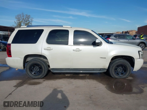 2012 Chevrolet Tahoe Commercial with VIN 1GNLC2E0XCR185593, listed as a IAAI auction lot 41217784 with 150,419 mi miles and . Bid and sale history available at DreamBid. Image 13.