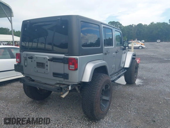 2016 Jeep Wrangler Unlimited Sahara with VIN 1C4BJWEG5GL117872, listed as a IAAI auction lot 42692798 with 119,819 mi miles and . Bid and sale history available at DreamBid. Image 4.
