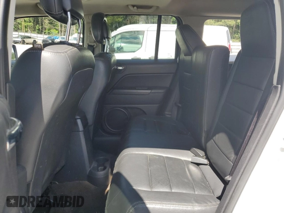2015 Jeep Patriot High Altitude z VIN 1C4NJPFA6FD107339, wystawiony jako Copart lot #57301635 z przebiegiem 191 004 mil mil oraz Szkoda całkowita • Salvage title. Historia ofert i sprzedaży dostępna na DreamBid. Obrazek 11.
