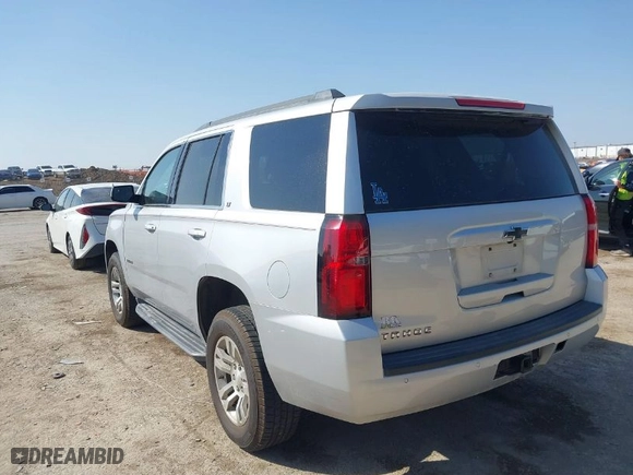 2016 Chevrolet Tahoe LT with VIN 1GNSKBKC5GR104714, listed as a IAAI auction lot 41794152 with 203,619 mi miles. Bid and sale history available at carsss.com. Image 3.