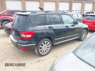 2010 Mercedes-Benz GLK with VIN WDCGG8HB0AF321592, listed as a IAAI auction lot 42114612 with 156,099 mi miles. Bid and sale history available at carsss.com. Image 4.