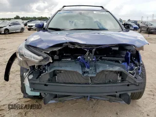 2024 Toyota Corolla Cross LE with VIN 7MUBAABG4RV092431, listed as a Copart auction lot 63900135 with 4,641 mi miles and Salvage title. Bid and sale history available at DreamBid. Image 5.