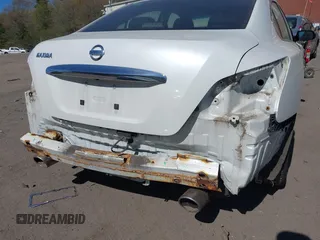 2013 Nissan Maxima SV z VIN 1N4AA5AP9DC806486, wystawiony jako IAAI lot #42159266 z przebiegiem 102 908 mil mil oraz . Historia ofert i sprzedaży dostępna na DreamBid. Obrazek 6.