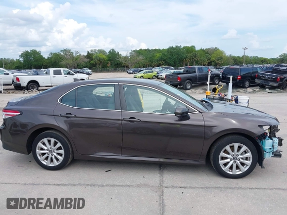2019 Toyota Camry LE with VIN 4T1B11HKXKU818442, listed as a IAAI auction lot 41906128 with 30,728 mi miles and . Bid and sale history available at DreamBid. Image 14.