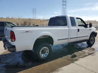 1999 Ford F-250 XL with VIN 1FTNX21S6XEC94109, listed as a Copart auction lot 47988005 with 135,673 mi miles and Salvage title. Bid and sale history available at DreamBid. Image 3.