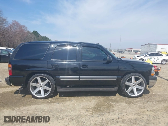 2003 Chevrolet Tahoe LT with VIN 1GNEC13Z73J322783, listed as a IAAI auction lot 41773868 with 259,710 mi miles and . Bid and sale history available at DreamBid. Image 14.