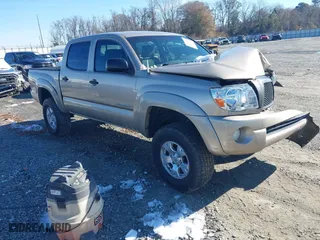 2005 Toyota Tacoma PreRunner with VIN 3TMJU62N25M006858, listed as a IAAI auction lot 41396494 with 236,357 mi miles. Bid and sale history available at carsss.com. Image 1.
