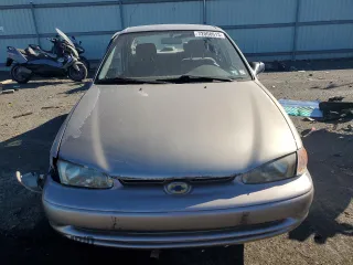 1998 Chevrolet Prizm z VIN 1Y1SK5289WZ434033, wystawiony jako Copart lot #54037694 z przebiegiem 76 601 mil mil oraz Szkody całkowita. Historia ofert i sprzedaży dostępna na DreamBid. Obrazek 10.