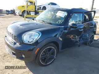 2013 MINI Countryman S z VIN WMWZC3C57DWP22928, wystawiony jako IAAI lot #41665753 z przebiegiem Nie podano mil oraz . Historia ofert i sprzedaży dostępna na DreamBid. Obrazek 17.