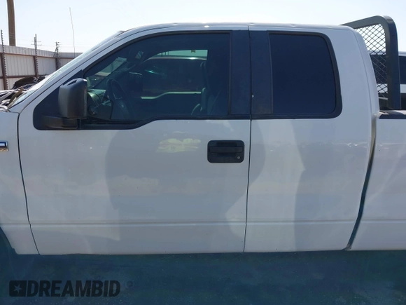 2007 Ford F-150 STX with VIN 1FTRX14W97KD36834, listed as a IAAI auction lot 42548806 with 207,391 mi miles and . Bid and sale history available at DreamBid. Image 14.