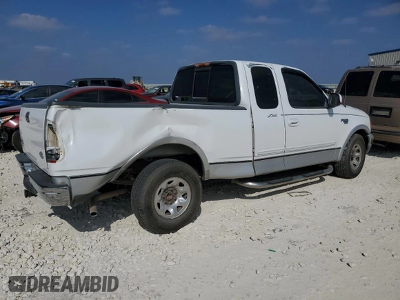1999 Ford F-250 с VIN 1FTRX27L8XKA26097, выставлен на аукционе Copart как лот 43270015 с пробегом 201 792 миль миль и Списание • Salvage title. История ставок и продаж доступна на DreamBid. Изображение 3.
