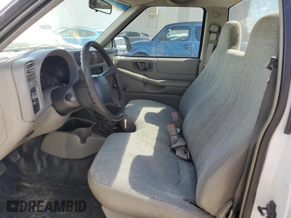 2000 Isuzu Hombre S z VIN 1GGCS1444Y8701114, wystawiony jako Copart lot #74325664 z przebiegiem 210 803 mil mil oraz Szkody całkowita. Historia ofert i sprzedaży dostępna na DreamBid. Obrazek 7.