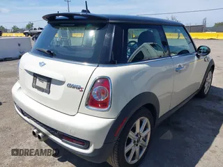 2011 MINI Hardtop S with VIN WMWSV3C50BTY23450, listed as a IAAI auction lot 42121502 with 239,025 mi miles and . Bid and sale history available at DreamBid. Image 4.