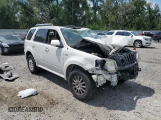 2009 Mercury Mariner Premier с VIN 4M2CU87709KJ14823, выставлен на аукционе Copart как лот 60121965 с пробегом Не указан миль и Списание • Salvage title. История ставок и продаж доступна на DreamBid. Изображение 4.