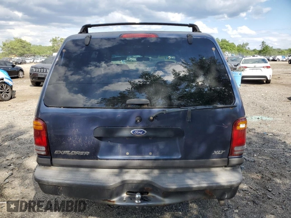 2000 Ford Explorer XLT с VIN 1FMZU73E4YZA81714, выставлен на аукционе Copart как лот 58205685 с пробегом 141 966 миль миль и Списание • Salvage title. История ставок и продаж доступна на DreamBid. Изображение 6.