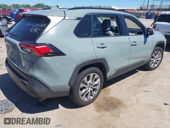 2021 Toyota RAV4 XLE Premium with VIN 2T3C1RFV0MW140682, listed as a IAAI auction lot 42315813 with 98,267 mi miles and . Bid and sale history available at DreamBid. Image 4.