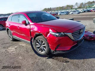2021 Mazda CX-9 Touring with VIN JM3TCBCYXM0506837, listed as a IAAI auction lot 41494903 with 23,765 mi miles. Bid and sale history available at carsss.com. Image 1.