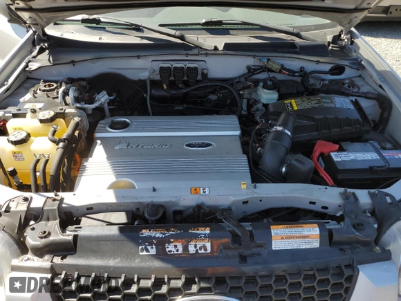 2006 Ford Escape Hybrid with VIN 1FMYU96H06KA69739, listed as a Copart auction lot 53856245 with 121,454 mi miles and Salvage title. Bid and sale history available at DreamBid. Image 12.
