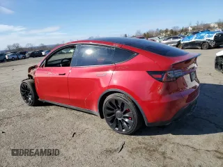 2023 Tesla Model Y Performance with VIN 7SAYGDEFXPF790747, listed as a Copart auction lot 42233855 with 25,452 mi miles and Salvage Title. Bid and sale history available at DreamBid. Image 2.