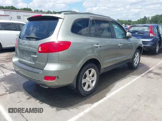 2007 Hyundai Santa Fe SE with VIN 5NMSH13E77H128941, listed as a IAAI auction lot 42641419 with 209,159 mi miles and . Bid and sale history available at DreamBid. Image 4.