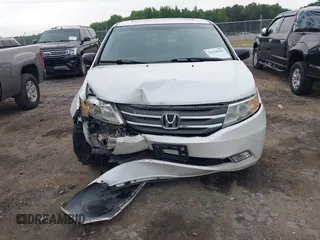 2012 Honda Odyssey Touring with VIN 5FNRL5H93CB034485, listed as a IAAI auction lot 42304502 with 198,589 mi miles and . Bid and sale history available at DreamBid. Image 12.