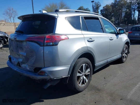2018 Toyota RAV4 XLE with VIN 2T3WFREV7JW408039, listed as a IAAI auction lot 41686372 with 94,125 mi miles. Bid and sale history available at carsss.com. Image 4.